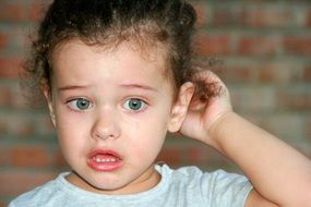 cute toddler with curly hair