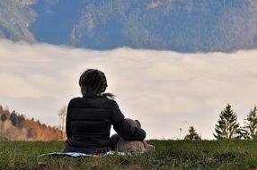 girl sitting with teddy bear outdoor