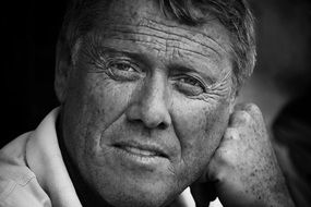 Wrinkled man face black and white