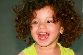 happy child with curly hair