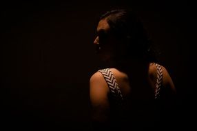 Photo of Person in a dark