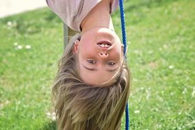 little girl upside down