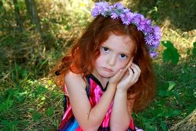 beauty of the baby girl with red hair