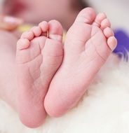 pink children feet close-up