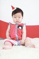 photo of a sleepy chinese baby