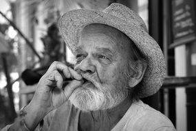 portrait of an old man with cigar