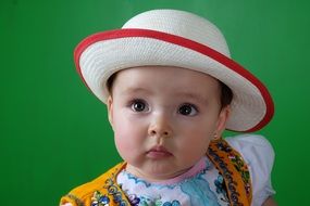 photo of a little girl in a hat