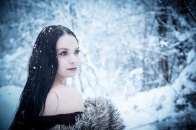 glamour woman in the winter forest