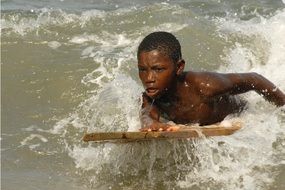 ghana boy sea surfer surf