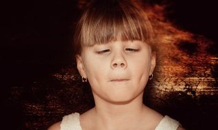 girl making faces
