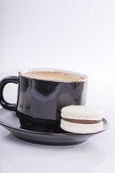 cup of coffee with macaroon