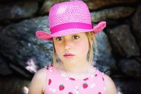 photo of a girl in a pink hat