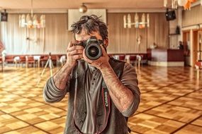 photographer with a digital SLR camera