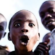 portrait of surprised black child
