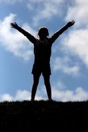 silhouette of a happy child