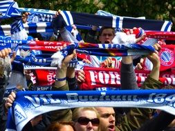 football fans with scarves
