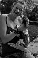dog licking his owner