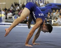 performing male gymnast