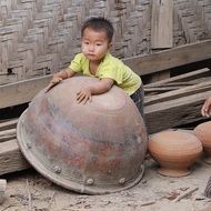 child boy with a big clay pot, myanmar