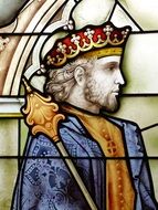 portrait of a king in a colorful stained glass window