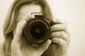 black and white photo of camera lens