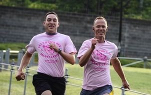 two runners in pink t-shirts