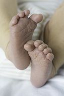 Closeup photo of baby feet