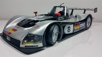 model racing car le mans 1999 on silver white background