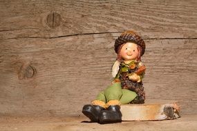 Unusual doll figure wooden wall aback
