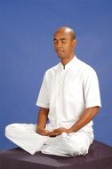 buddhist man is meditating