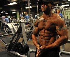 tattooed bodybuilder in gym