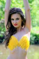 caucasian long haired girl in bikini outdoor