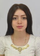 portrait of a girl with loose hair on a blue background