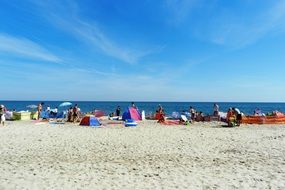 people relax on the beach of the Baltic Sea