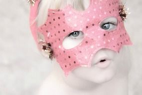 Pink mask on a girl's face