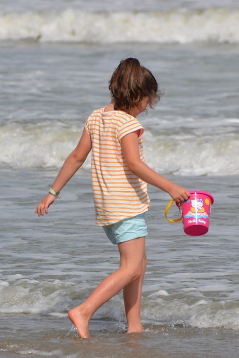 child with bucket