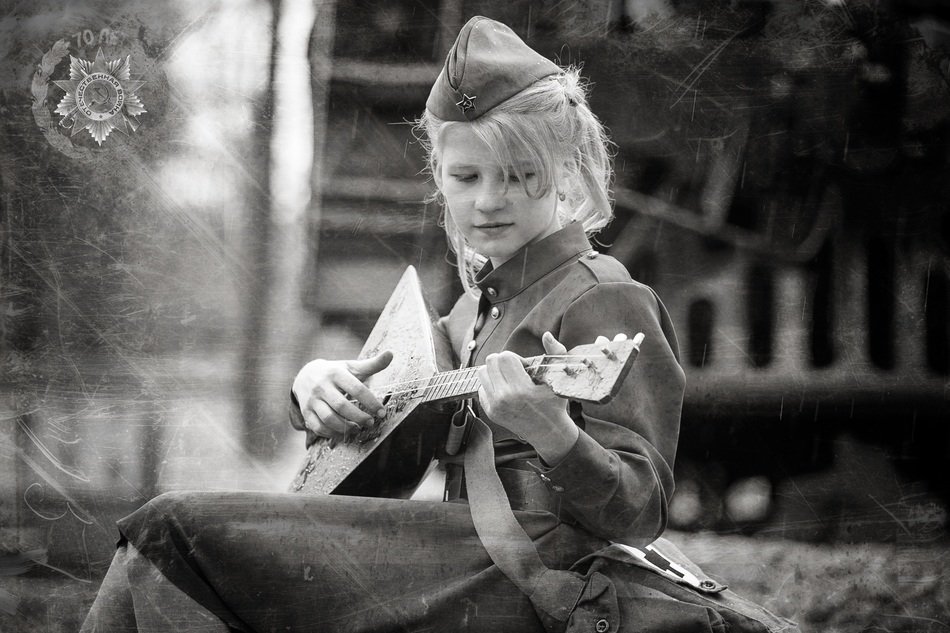girl in balolajka victory day