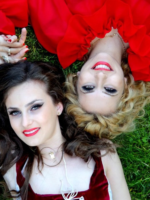 portrait of girls on green grass