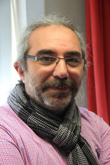 portrait of a man in glasses