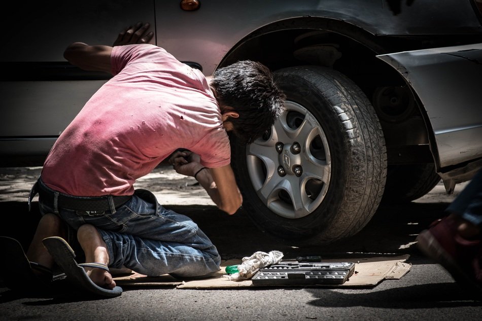 car mechanic in the working process