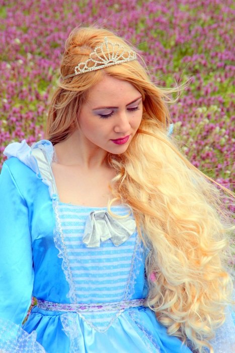 Princess girl on the background of spring nature