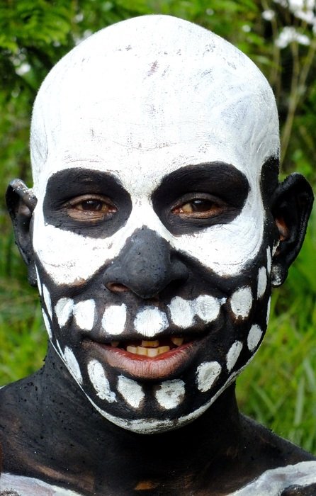 skull mask, person with black and white painted face