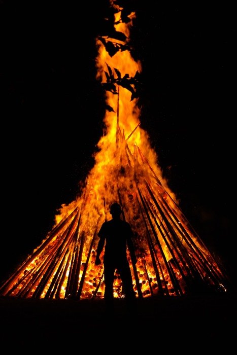 silhouette of a man on the flame background