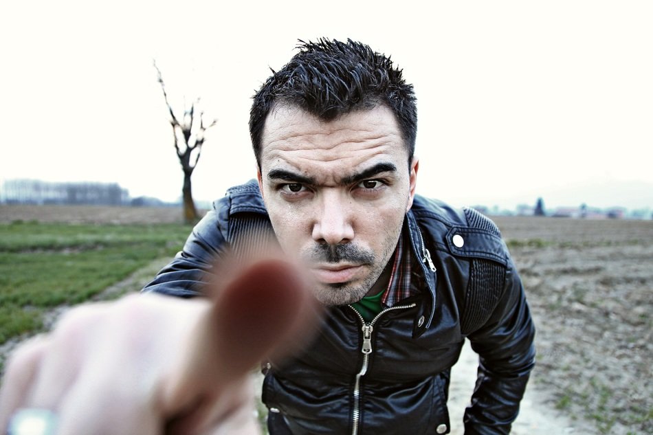 man pointing finger to camera