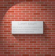 Red brick wall with banner