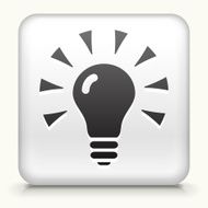 Black and white lit lightbulb icon N2