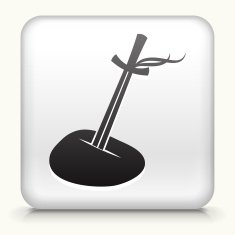 Square Button with Medieval Sword stuck in stone