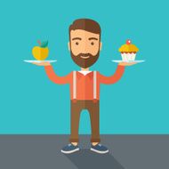 Man carries with his two hands cupcake and apple N4