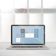 Open laptop with blurred background Vector