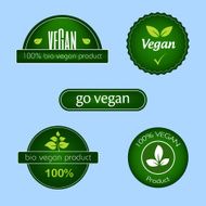 Collection of green vegan food labels and badges